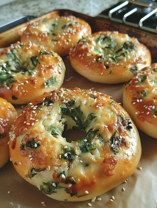 cheesy spinach artichoke bagels